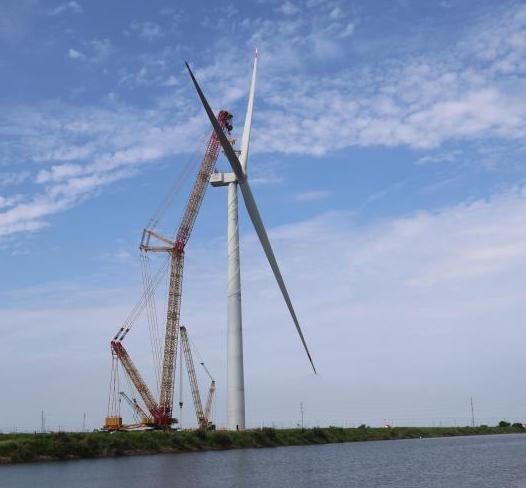 單機年發電量1億度！全球最大海上風電機組完成吊裝